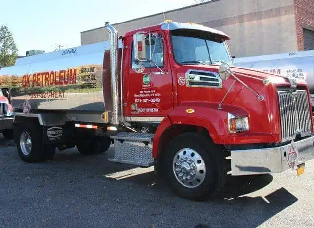 What are the steps involved in removing or replacing an old heating oil tank?
